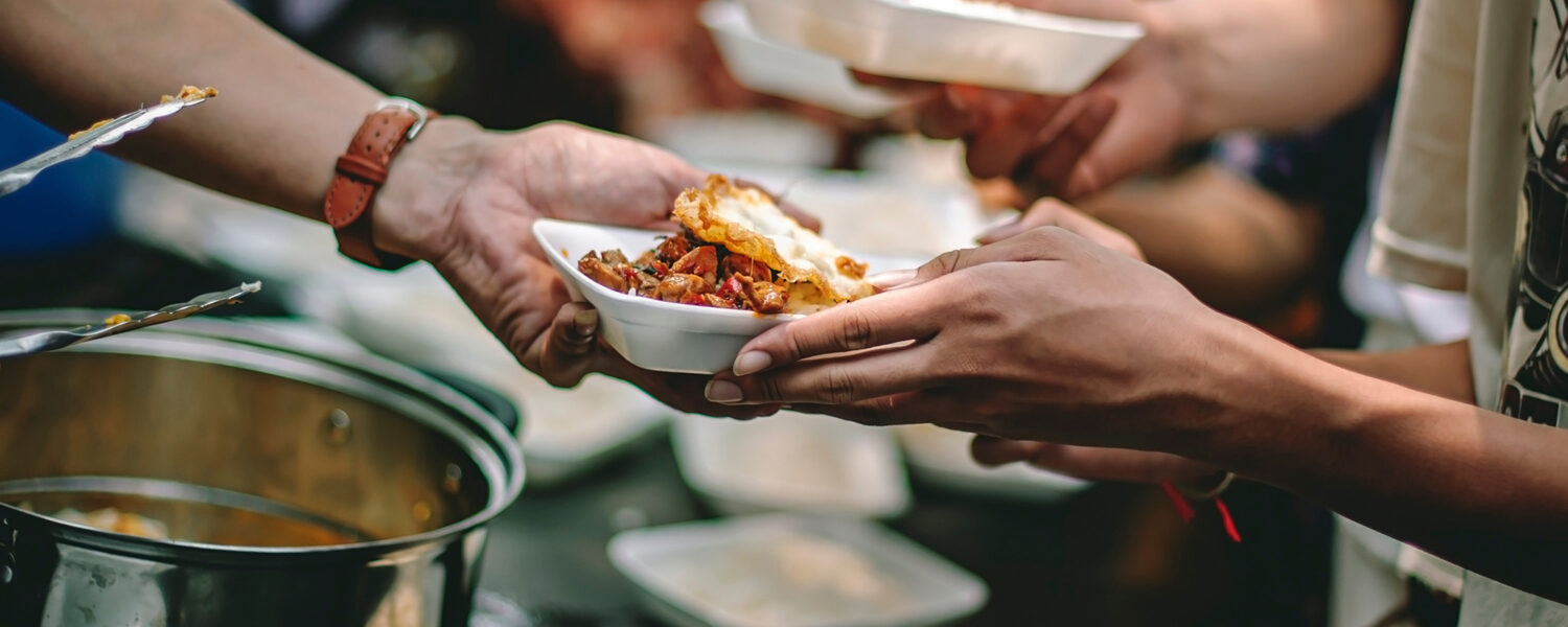 Volunteers helping provide meals
